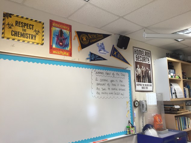 Part of my white-board (cute, colorful border again) and wall decor. We are an AVID school, so I am sporting an AVID pennant as well as some colleges too. Of course I have some fun "Sciencey"/nerdy posters on my wall (I have to show my personality!).