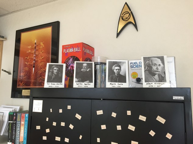Again, I enjoy creating unique and fun decor in my classroom that both showcase my interests and Science. I like having the framed photos of famous Scientists as a reminder of our past and who have lead us to our current place of knowledge. I also have my awesome plasma ball that I bring out for fun demos during the year, my Star Trek clock (again, my personality), and a picture of rowing (my collegiate sport as well as a representation of team work-- very important in a Science classroom!). On the black cabinet I have magnet words for my students to crete poetry. So far, I have found a Haiku about food-- it was during 4th period before lunch, so not much of a surprise there.