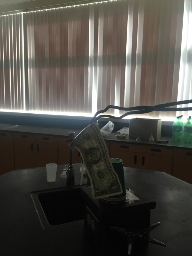 As you can see, the bill is completely unscathed! The fuel source completely burned up, and the salt water kept the bill from getting hot enough to burn as a secondary fuel source! 