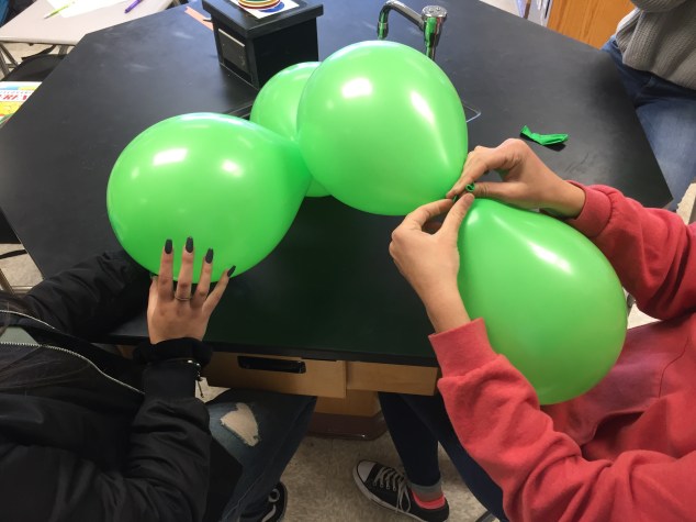 These students are starting to assemble their orbital. 